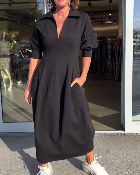 Minimalistyczna sukienka midi o strukturalnym i nowoczesnym stylu