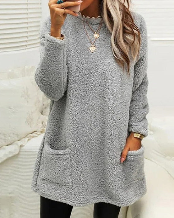 Sweter damski z kieszeniami