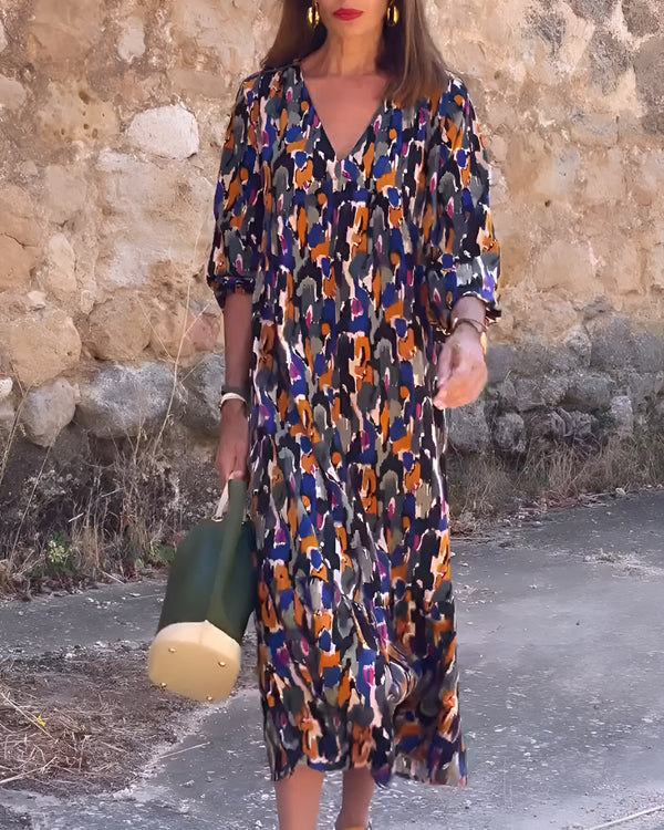 Sukienka midi z dekoltem w szpic i eleganckim nadrukiem w stylu retro