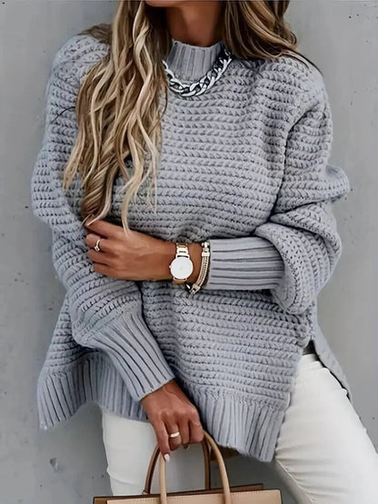 Sweter oversize z długimi rękawami i rozcięciami po bokach