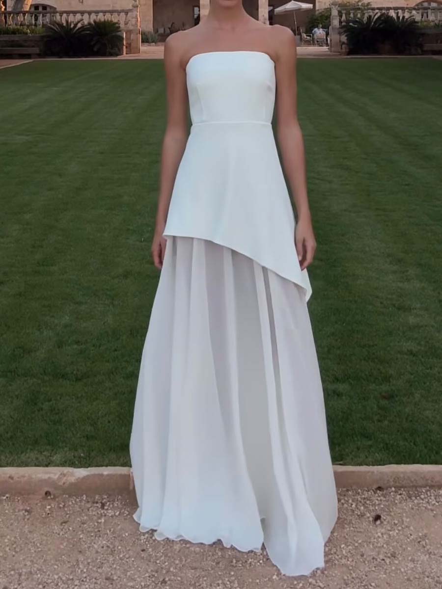Elegancka sukienka bez ramiączek z asymetrycznym wzorem na specjalne okazje