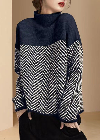 Sweter z wysokim kołnierzem: wygoda i styl w jednym produkcie