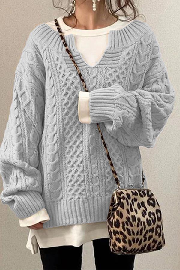 Sweter z eleganckim wzorem o luźnym kroju zapewniającym modny wygląd