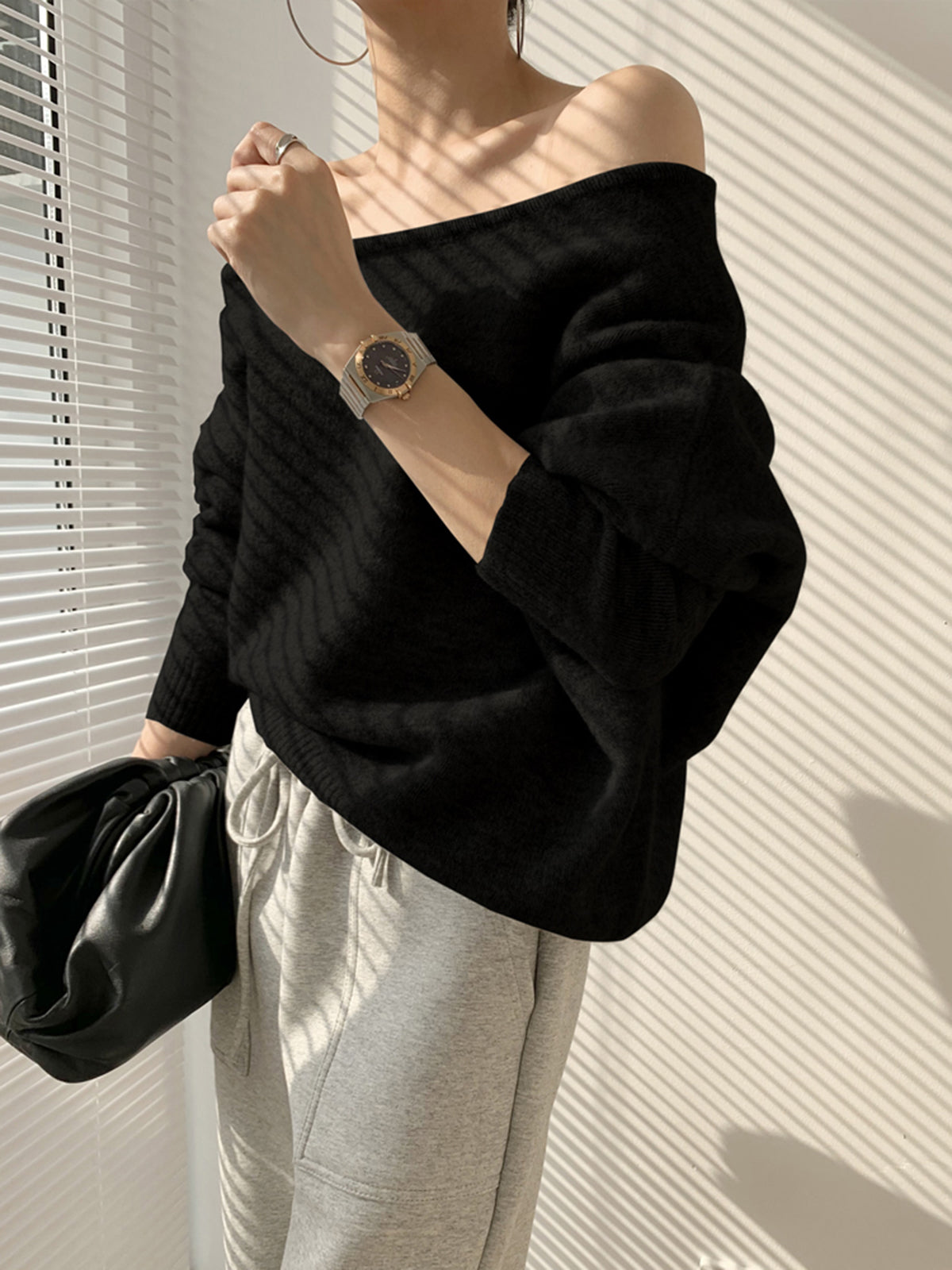Sweter z asymetrycznymi ramionami - Elegancka dzianina dla szykownego stylu