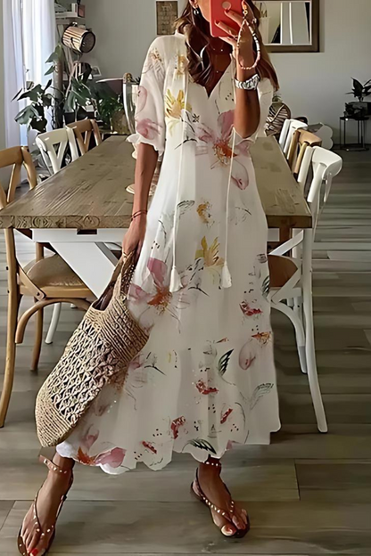 Anouk - Długa elegancka sukienka w kwiaty