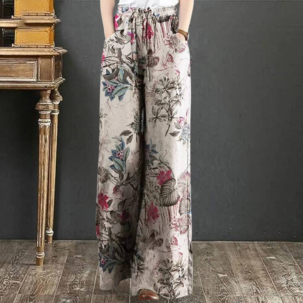 Kirsi - Eleganckie szerokie spodnie z kwiatowym nadrukiem