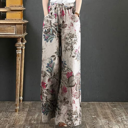 Kirsi - Eleganckie szerokie spodnie z kwiatowym nadrukiem