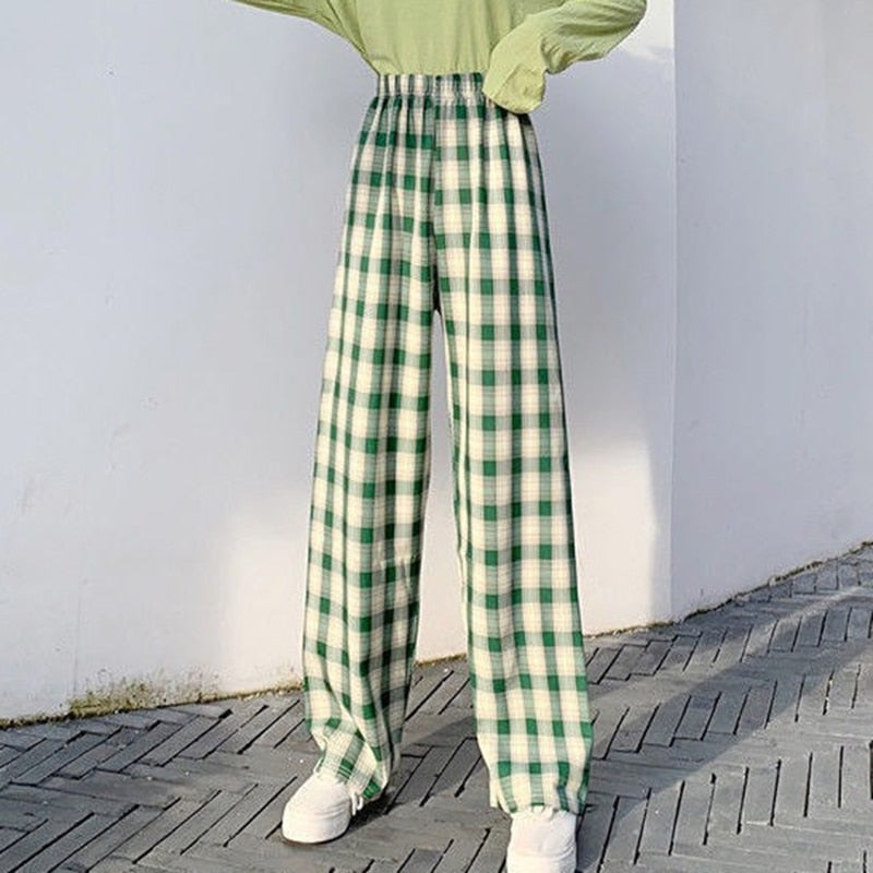 Spodnie Paola - Damskie spodnie w kratę z wysokim stanem zapewniające modny, swobodny wygląd.