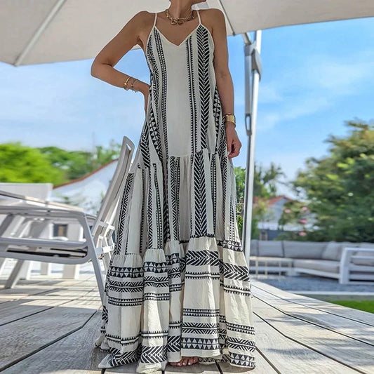 Debbie - Elegancka sukienka bez rękawów z falbanami i swobodnym nadrukiem