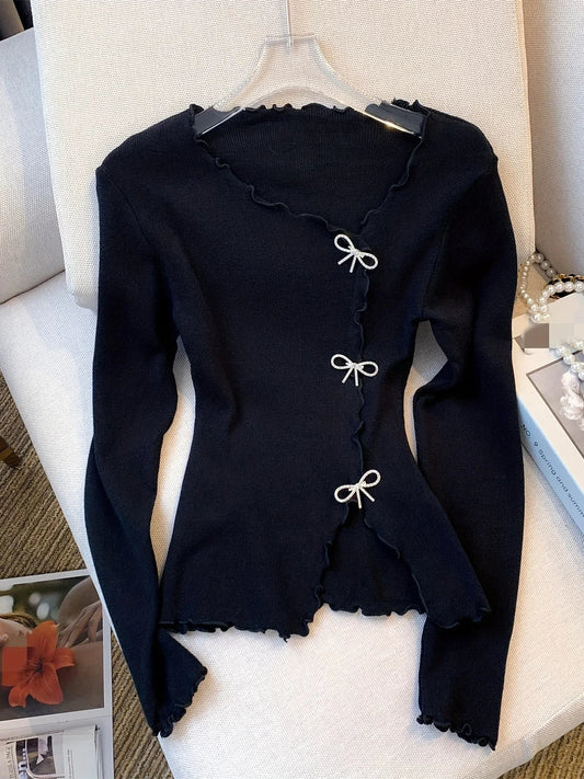 Sweter z kokardą dla kobiet