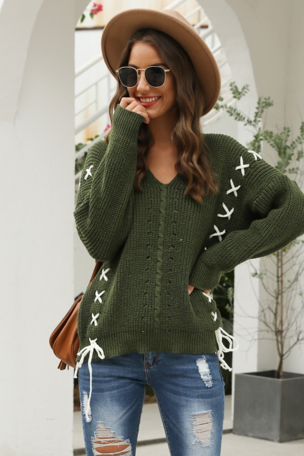 Sweter z dzianiny z paskiem w kroku dla kobiet