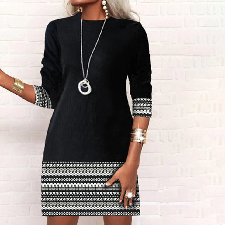 - Elegancka casualowa sukienka z nadrukiem